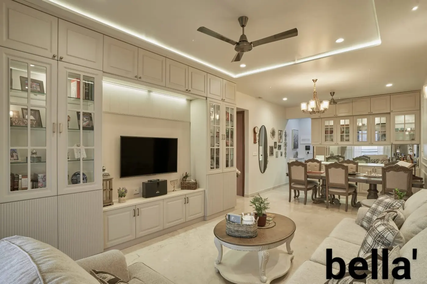 Living room TV unit with glass display cabinets and dining area, Kalyani Nagar, Pune
